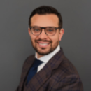 Professional headshot of attorney Caleb Brus